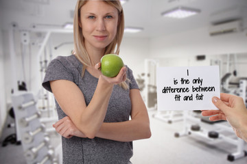 Wall Mural - Female dieting and Fitness motivation message I is the only difference between fit and fat. Inspirational quotation.