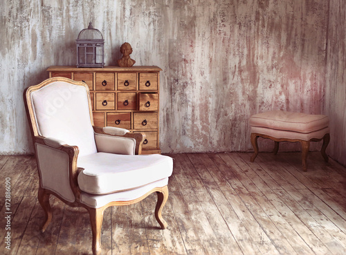 Wooden Chest Of Drawers In Shabby Styled Room With Bird Cage