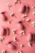 Pink Hand Grenades With White Flowers On Pink Background