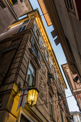 Typical view of a dark alley in the downtown of Genoa