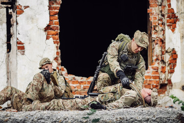 Wall Mural - Army soldier during the military operation in the city. war, army, technology and people concept.