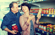 © JackF - Husband and wife selecting a snacks