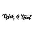 © tumana_net - Trick or treat - hand drawn halloween lettering quote isolated on the white background. Fun brush ink inscription for photo overlays, greeting card or t-shirt print, poster design.