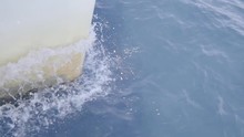 Slow Motion Detail Bow Of Sailing Boat In Water