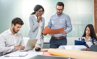 Business people working on new project in office.