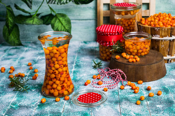 Berries of sea buckthorn with syrup