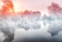 Beautiful Autumn Scenery At Seversky Donets River, Morning Foggy Scene. Trees At The River Bank Reflect In Water. Fall Landscape, Pristine Nature Background.