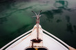 © Robert Lang Photography/Stocksy - Bow of a small boat with anchor