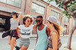 © Jacob Lund/Stocksy - Group of young people walking in the city