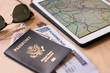 © Jovo Jovanovic/Stocksy - Boarding pass and passport with digital tablet