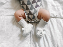 Cute Newborn Baby Feet And Legs