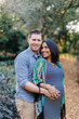 © Jakob/Stocksy - A beautiful pregnant woman being embracing by her husband