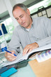 © auremar - man in office writing