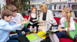 © Africa Studio - Teacher and schoolchildren at library