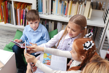 Wall Mural - Children studying at school library