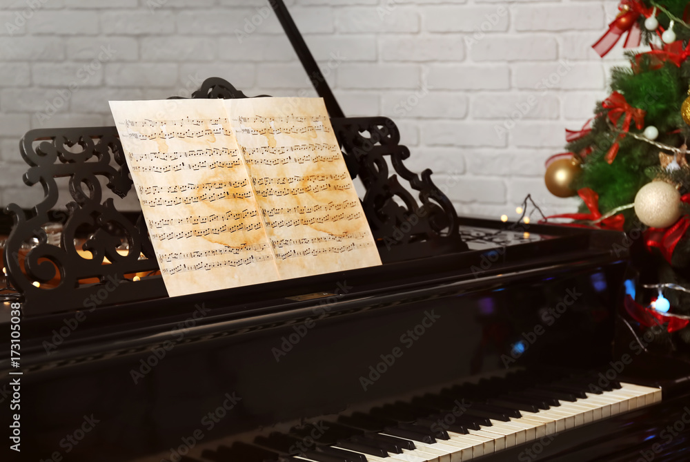 Grand piano in room. Christmas music concept