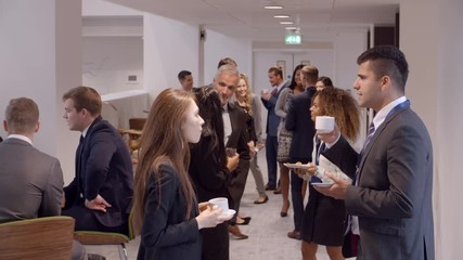 Wall Mural - Delegates Networking During Coffee Break At Conference