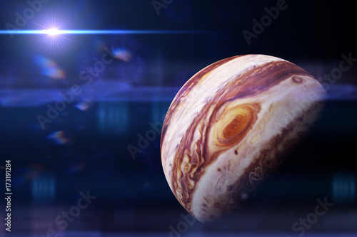 Zdjęcie XXL planeta Jowisz oświetlona przez jasne Słońce