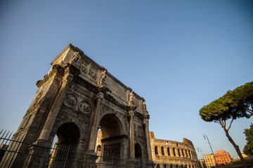 Wall Mural - ruins of antique Colosseum and Arch of Constantine, Rome Italy