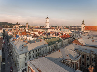 Aerial panorama of Lviv - city center view, historical center at sunset time, Ukraine. Drone view.