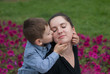 © ruslanshug - little boy gently kisses his mother
