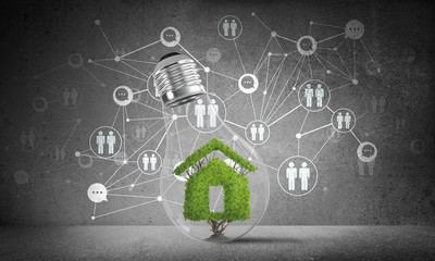 Wall Mural - house symbol inside glass lightbulb.