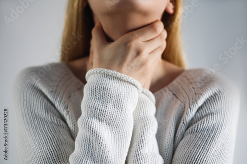 Cuadros en Lienzo Sore throat. Woman touching the neck