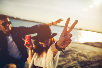 Happy couple outdoor, fashion styled friends have fun