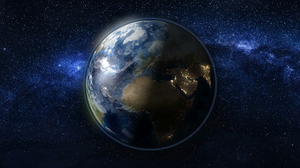 Wall Mural - planet earth rotate, spinning on its axis in black and blue universe of stars. africa and europe day