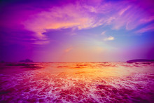 Beautiful Tropical Sunset In Krabi, Thailand. Dramatic And Picturesque Evening Scene. Ocean Waves And Colorful Cloudy Sky In The Background. Nature Landscape. Travel Background. Bright Purple Toning