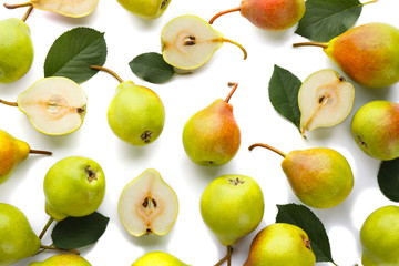 Wall Mural - Delicious ripe pears on white background