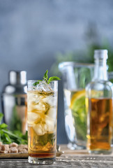 Canvas Print - Long glass with mint julep on kitchen table