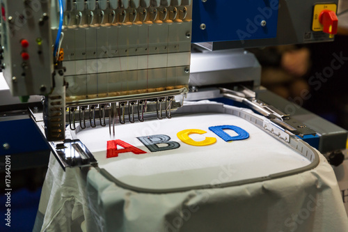 Fotomural Professional sewing machine embroidery letters
