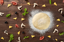 Dough Basis And Ingredients For Pizza, On The Table