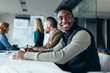 © Jacob Lund - African man sitting in board room