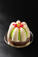 Wall Mural - Mini mousse pastry dessert covered with white chocolate velour