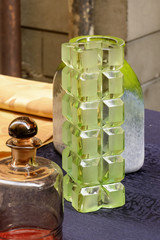 Wall Mural - green glass vintage vase on sale at street market, Chiavari , Italy