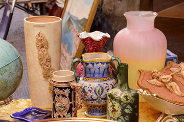 vases and art objects on sale at street market, Chiavari, Italy