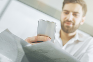 Wall Mural - Businessman using smartphone