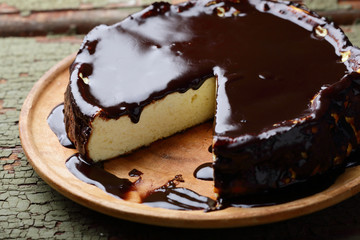 Canvas Print -  homemade cheesecake with chocolate icing