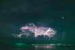 © Andrey Pavlov/Stocksy - Storm over the sea at night