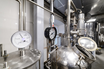 Wall Mural - Pressure gauges. Alcohol distillation equipment.