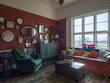 © Marc Rogoff/Stocksy - Retro, hipster, vintage inspired living room or lounge in an English house