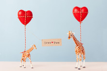 Giraffe Toys Holding Red Heart Balloons And A Card Spelling Love You.""iraffe Toy"""iraffe Toys Ho"