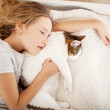 © Tatyana Gladskih - Child sleeping with cat