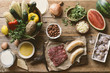 © Trent Lanz/Stocksy - Nutritious organic proteins and fresh ingredients on wooden table
