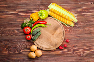 Sticker - Composition with fresh vegetables and board on wooden background