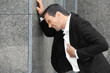 © Africa Studio - Mature man suffering from heart attack outdoors