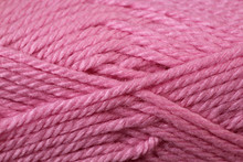 A Super Close Up Image Of Pink Yarn