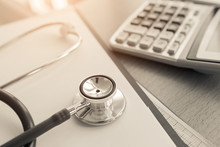 Health Care Costs Concept Picture : Stethoscope And Calculator On A Medical Chart ,symbol For Health Care Costs Or Medical Insurance